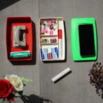 Organizer containing stationary items with a phone