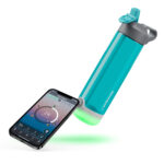 a phone with a device attached to it to track water intake