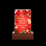 The Dsouza's wishes for merry Christmas engraved on Crystal Cube 5 x 5 x 8 cm with Metallic Printing and base