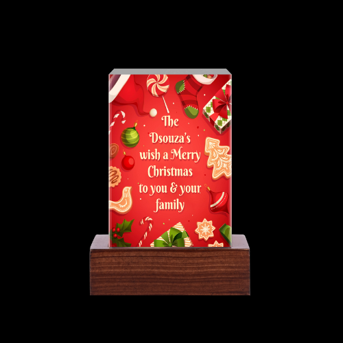 The Dsouza's wishes for merry Christmas engraved on Crystal Cube 5 x 5 x 8 cm with Metallic Printing and base