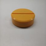 Round tablet shaped paperweight