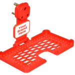 A smartphone holder in red, 3D-printed charging stand that is plugged into a wall outlet.