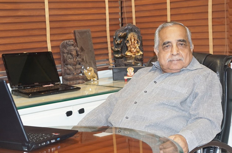 Shri Vishamber Khatri sitting in his cabin